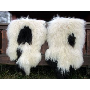 2 stk   langhrete skinn fra island. Hvite med sorte flekker. Ilustrasjonsbilde.